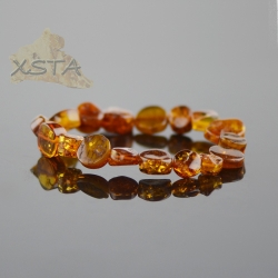 Amber bracelet with cognac color beads